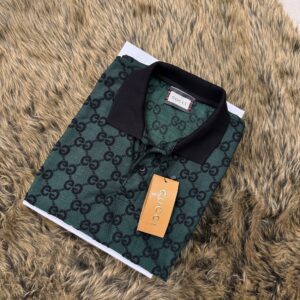 Guci self design knitted polo.